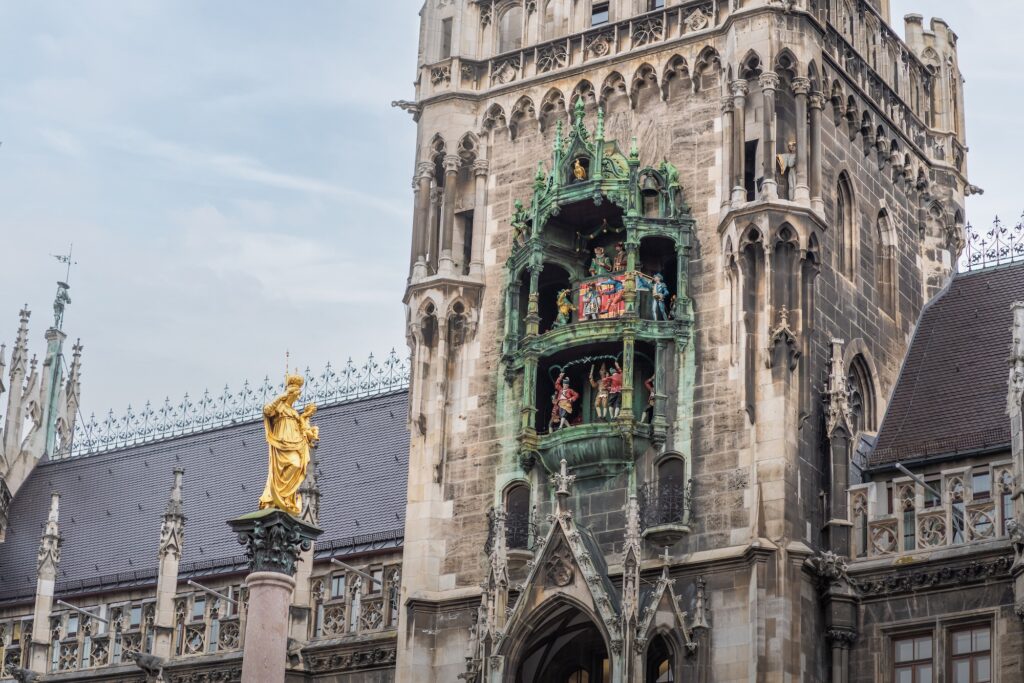 Glockenspiel clock of New Town Hall and Mariensäule Column - Munich, Bavaria, Germany