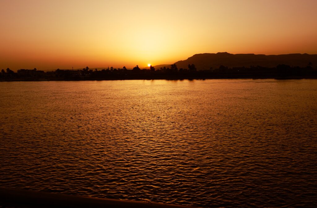 the Nile river at sunset in Egypt.